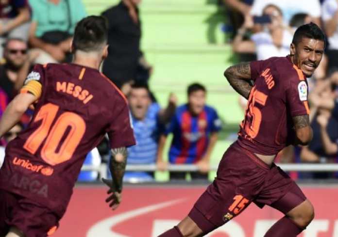 Lionel Messi dan Paulinho, Getafe vs Barcelona, Liga Spanyol Lionel Messi dan Paulinho, Getafe vs Barcelona, Liga Spanyol