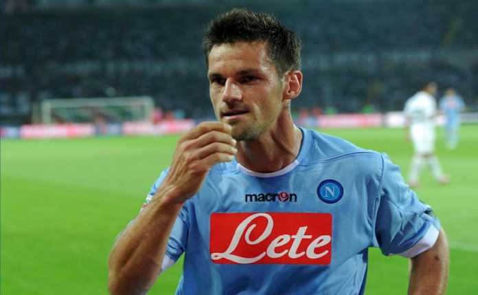 Christian Maggio Christian Maggio mengakui kekalahan Napoli di kandang Feyenoord dipengaruhi oleh hasil pertandingan Manchester City melawan Shakhtar Donetsk.