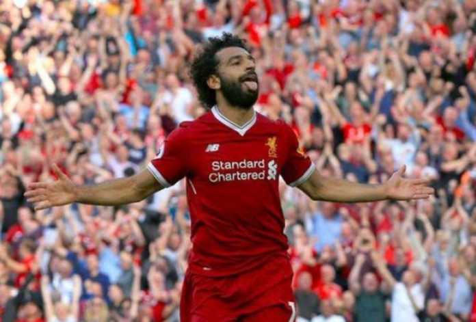 Mohamed Salah melakukan selebrasi saat laga Liverpool vs Sevilla Mohamed Salah melakukan selebrasi saat laga Liverpool vs Sevilla