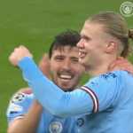 Erling Haaland dan Ruben Dias merayakan golnya bagi Manchester City