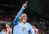Liga Inggris - Phil Foden merayakan gol ketiganya ke gawang Brentford