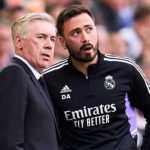 Carlo Ancelotti dan putranya Davide dalam sebuah laga Real Madrid