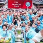 Manchester City saat merayakan Treble Winners
