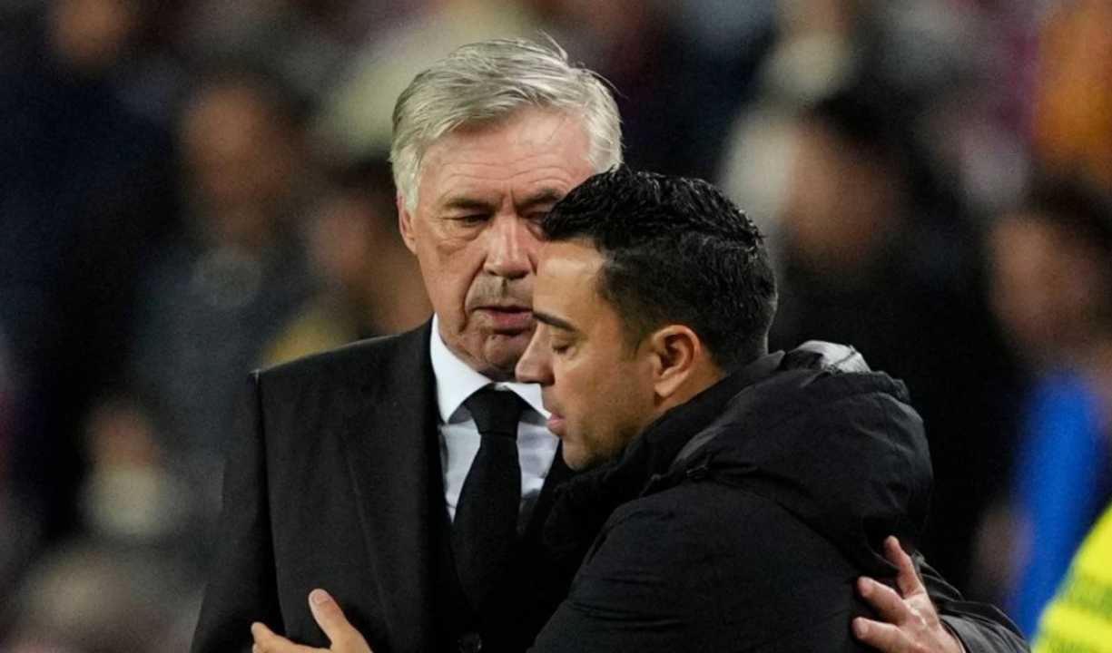 Pelatih Real Madrid Carlo Anceloti dan pelatih Barcelona Xavi Hernandez