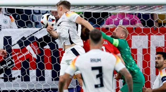 Nico Schlotterbeck saat mencetak gol di laga Jerman vs Denmark
