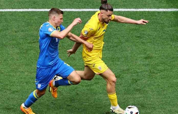 Rumania Bantai Ukraina 3-0 di laga pertama Grup E