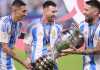 Lionel Messi bersama Angel Di Maria dan Nicolas Otamendi usai juara Copa America