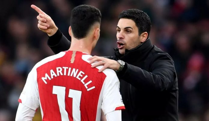 Pelatih Arsenal Mikel Arteta dan Gabriel Martinelli