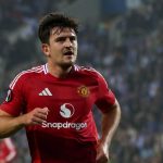 Harry Maguire rayakan gol ke gawang Porto