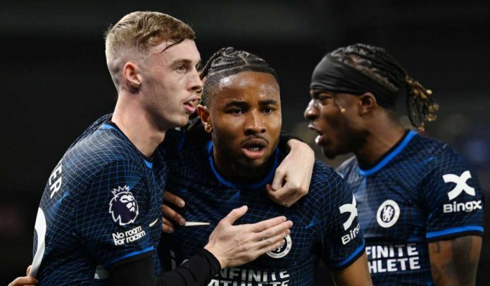 Christopher Nkunku rayakan golnya bersama Cole Palmer dan Noni Madueke