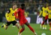 Alphonso Davies saat membela Bayern Munchen hadapi Borussia Dortmund