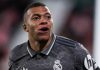 Kylian Mbappe berselebrasi atas golnya untuk Real Madrid