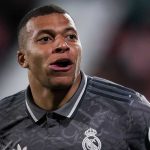 Kylian Mbappe berselebrasi atas golnya untuk Real Madrid