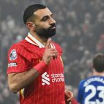 Mohamed Salah merayakan gol ke gawang Leicester