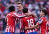 Para pemain Atletico Madrid merayakan gol