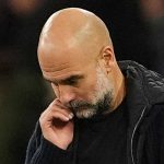 Pep Guardiola tampak murung usai kekalahan derby Manchester