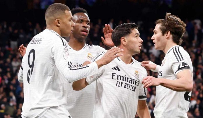 Brahim Diaz bersama Kylian Mbappe dan Vinicius Junior dalam selebrasi gol Real Madrid