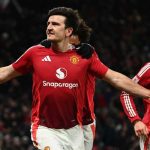 Harry Maguire merayakan gol ke gawang Leicester City