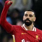 Mohamed Salah merayakan gol ke gawang Manchester City