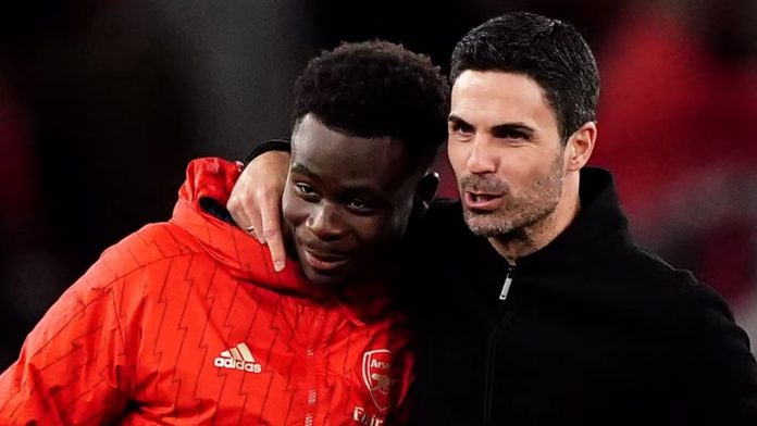 Bukayo Saka dan Mikel Arteta - Arsenal