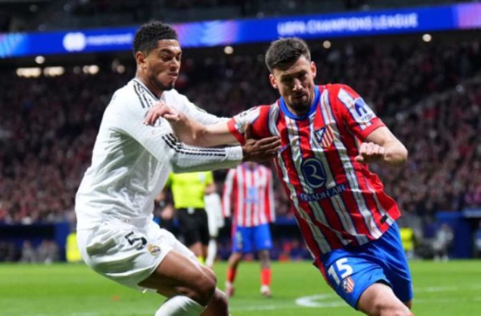 Clement Lenglet saat berhadapan dengan Bellingham dalam Derby Madrid