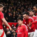 Harry Maguire merayakan gol bersama rekan-rekannya di Manchester United