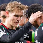Martin Odegaad merayakan gol yang dicetak Jurrien Timber
