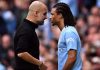 Pep Guardiola dan Nathan Ake - Manchester City