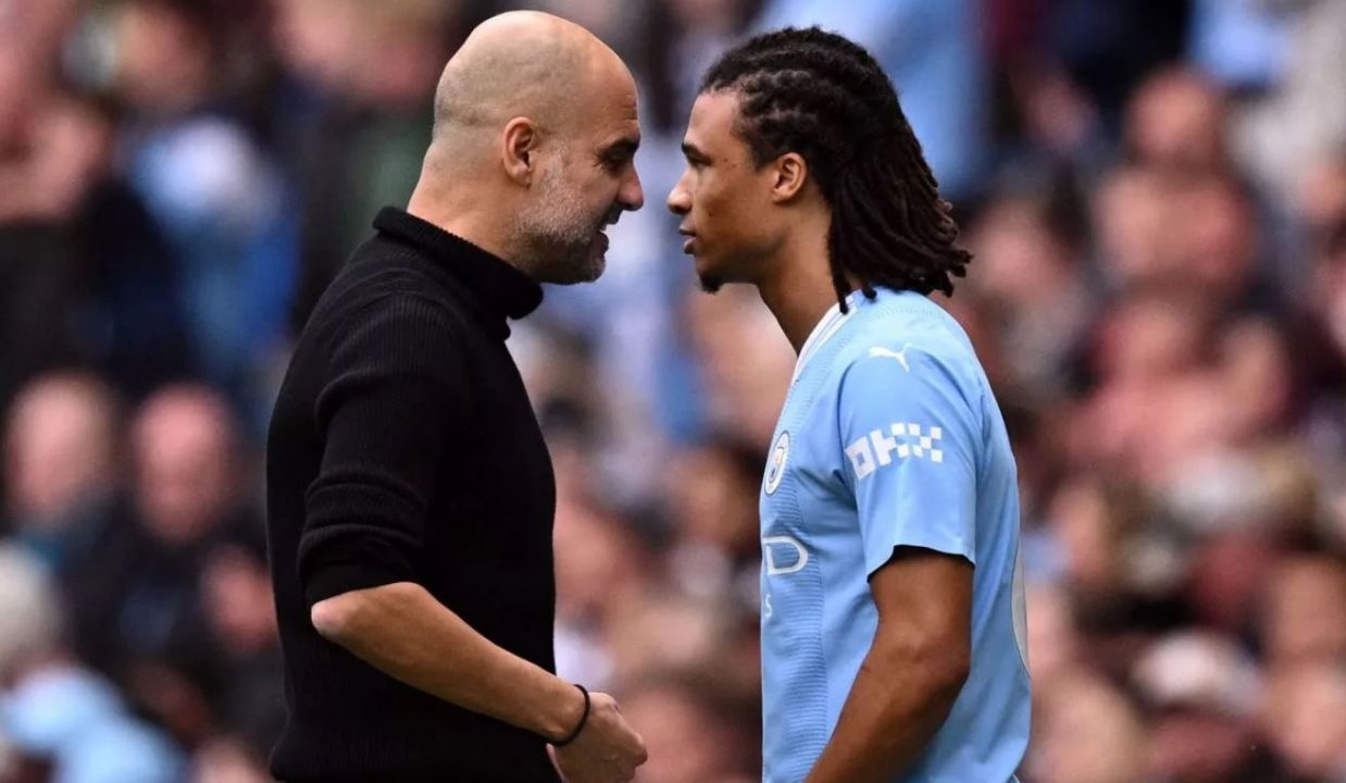 Pep Guardiola dan Nathan Ake - Manchester City