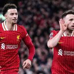 Curtis Jones merayakan gol Diogo Jota di laga Liverpool vs Everton
