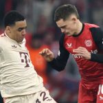 Florian Wirtz berduel dengan Jamal Musiala di laga Bayer Leverkusen vs Bayern Munchen