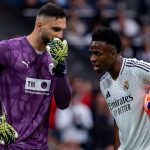 Giorgi Mamardashvili berbicara dengan Vinicius Junior