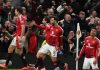 Harry Maguire merayakan gol kemenangan Manchester United
