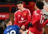 Liam Delap berselisih dengan para pemain Manchester United