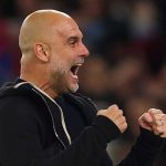 Pep Guardiola merayakan gol kemenangan Manchester City atas Aston Villa
