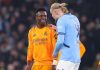 Vinicius Junior berbicara dengan Erling Haaland di laga Manchester City vs Real Madrid