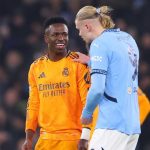 Vinicius Junior berbicara dengan Erling Haaland di laga Manchester City vs Real Madrid
