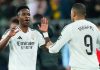 Vinicius Junior merayakan gol bersama Kylian Mbappe