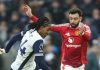 Bruno Fernandes dan Djed Spence di laga Tottenham kontra Manchester United
