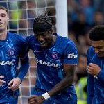 Cole Palmer merayakan gol bersama Noni Madueke dan Jadon Sancho