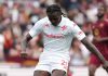 Moise Kean mengeksekusi bola di laga AS Roma vs Fiorentina