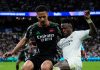 William Saliba mengawal Vinicius Junior di laga Real Madrid vs Arsenal