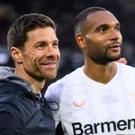 Xabi Alonso bersama Jonathan Tah usai laga Freiburg vs Bayer Leverkusen