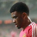 Amad Diallo tertunduk di laga Manchester United vs Hongkong