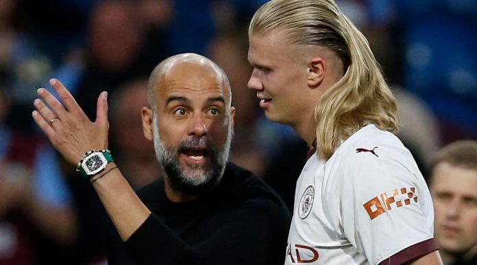 Pep Guardiola dan Erling Haaland