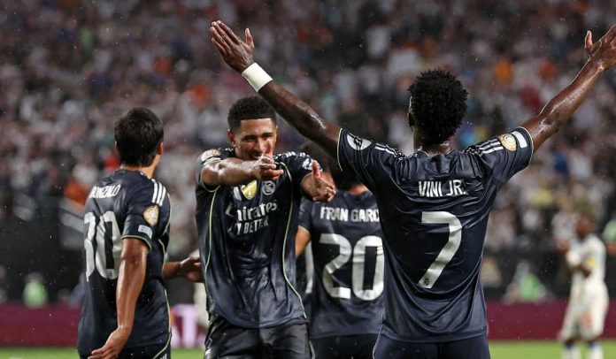 Vinicius Junior merayakan golnya bersama Jude Bellingham