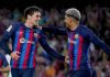 Christensen dan Araujo dalam sebuah laga Barcelona