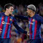 Christensen dan Araujo dalam sebuah laga Barcelona