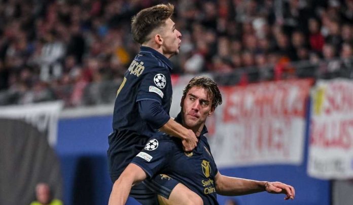 Francisco Conceicao merayakan gol Dusan Vlahovic