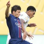 Joao Neves berebut bola dengan Jude Bellingham